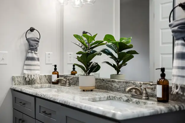 A Stylish Bathroom Vanity with Smooth Quartz Countertop for Any Bathroom